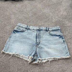 Divided Light Wash Denim Cutoff Shorts with Frayed Hem